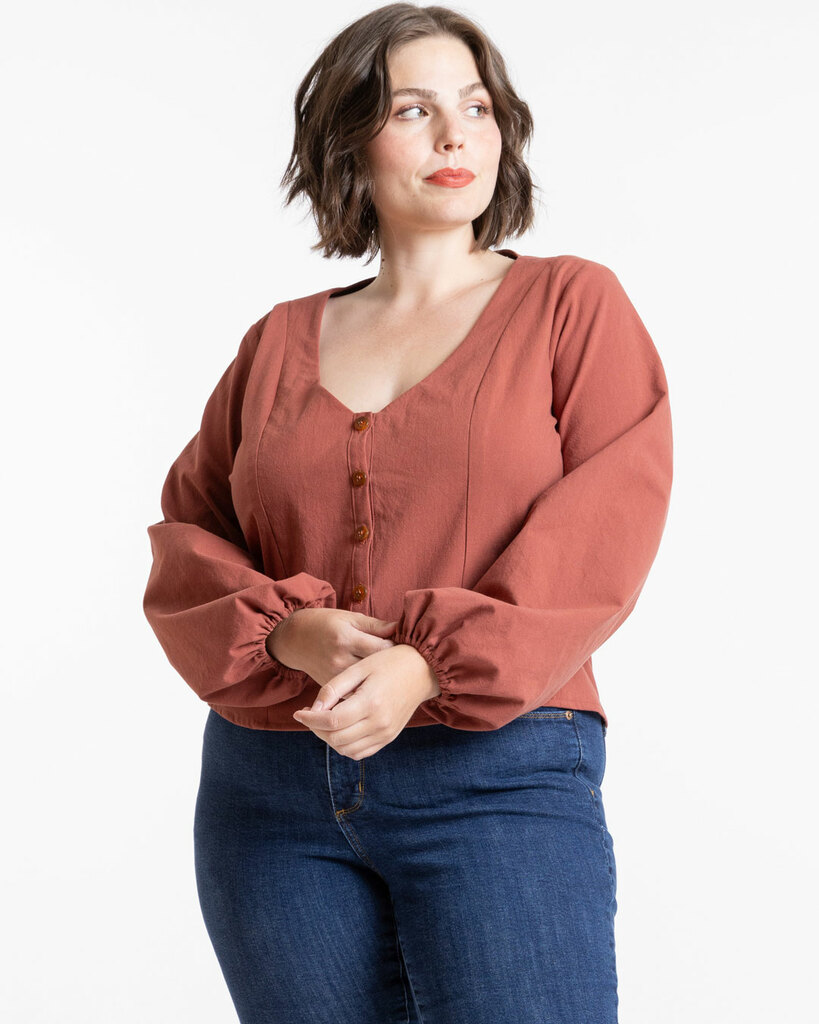 Morgan modeling the Sage blouse in pink crepe