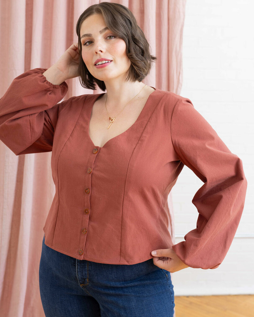 Morgan modeling the Sage blouse in pink crepe