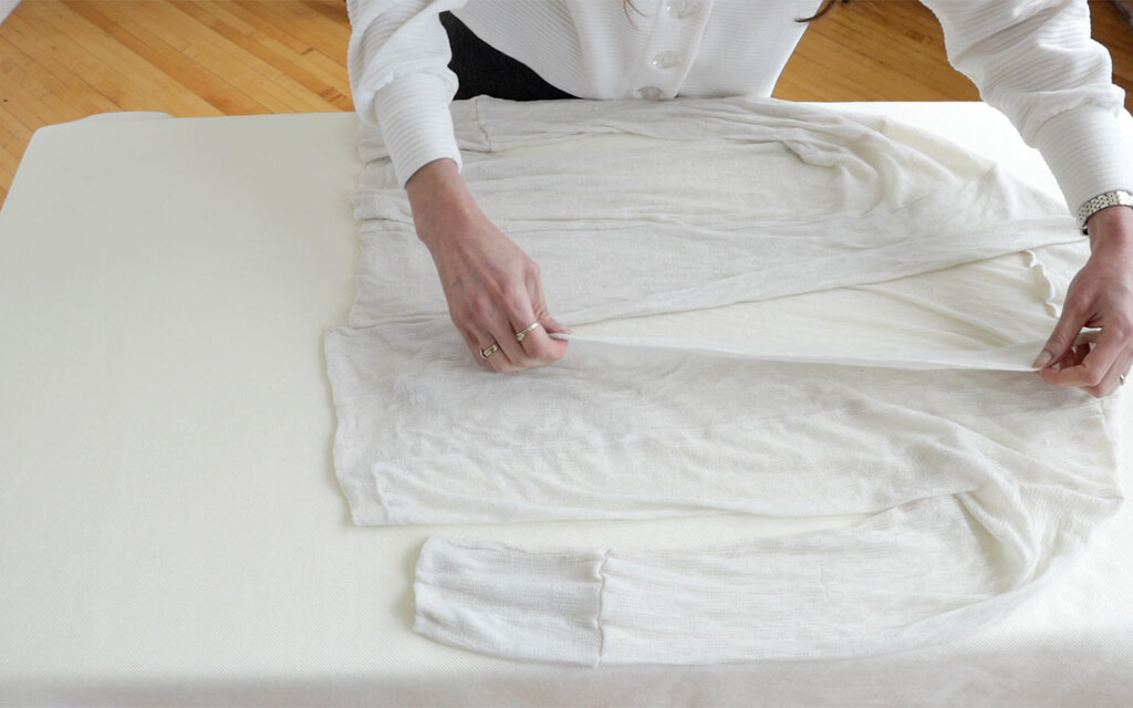 sweater laying flat to dry