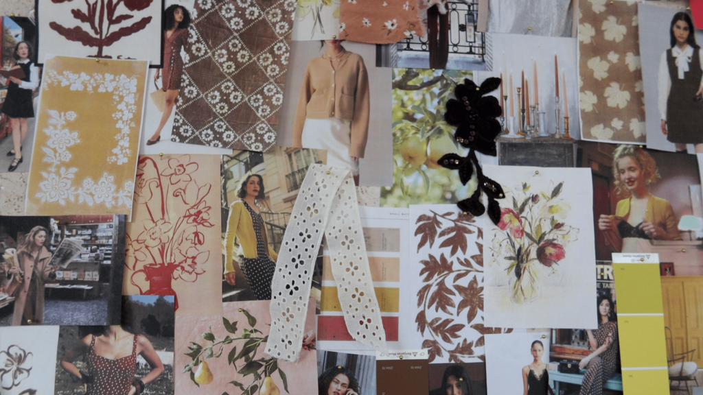 physical moodboard pinned to wall showing warm fall colors and textures