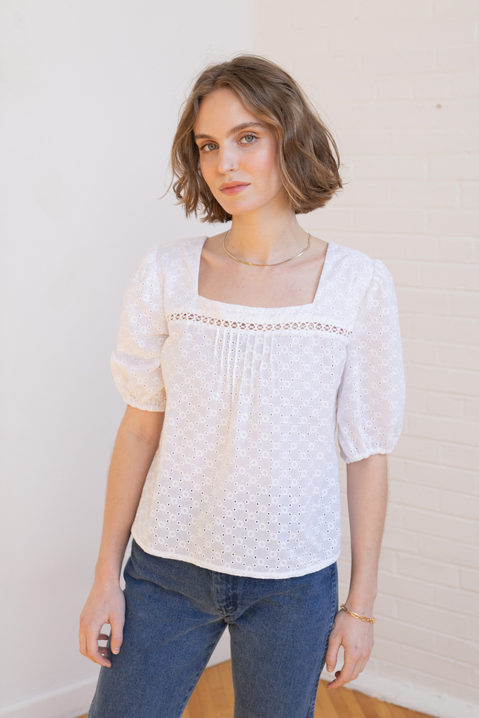 Woman modeling white Bloom blouse