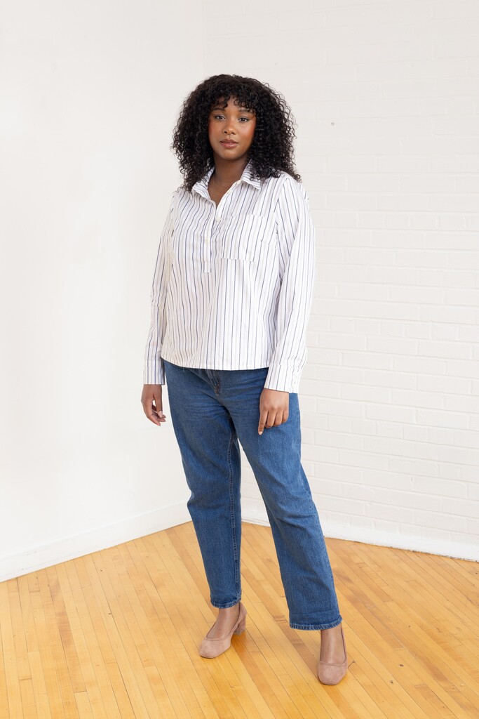 Woman wearing a striped Thyme member bonus shirt