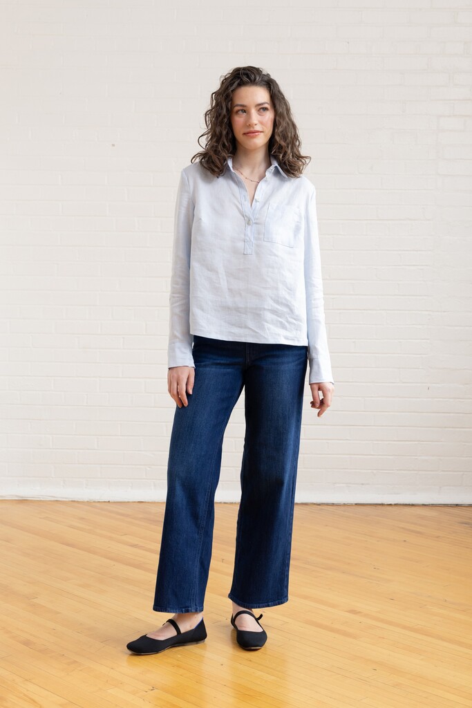 Woman wearing a blue Thyme member bonus shirt