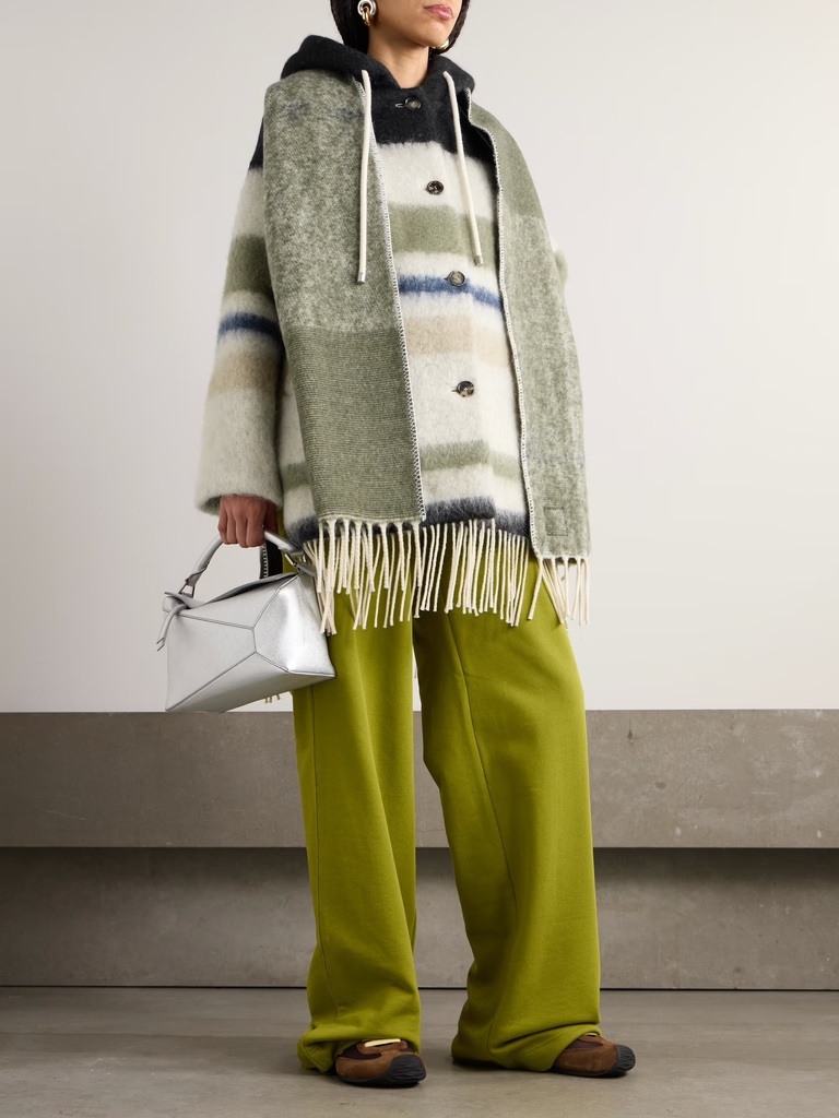 Coat with matching detachable scarf showing coordinated styling