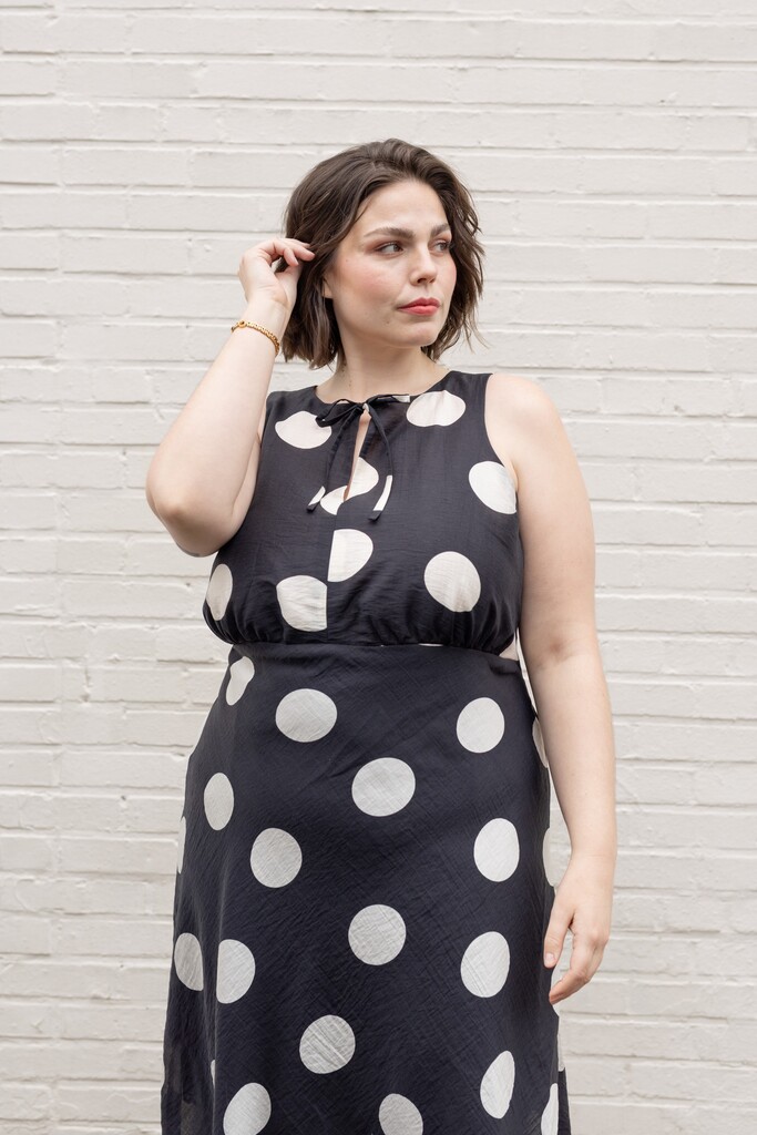 Model wearing polkadot Freesia dress close-up