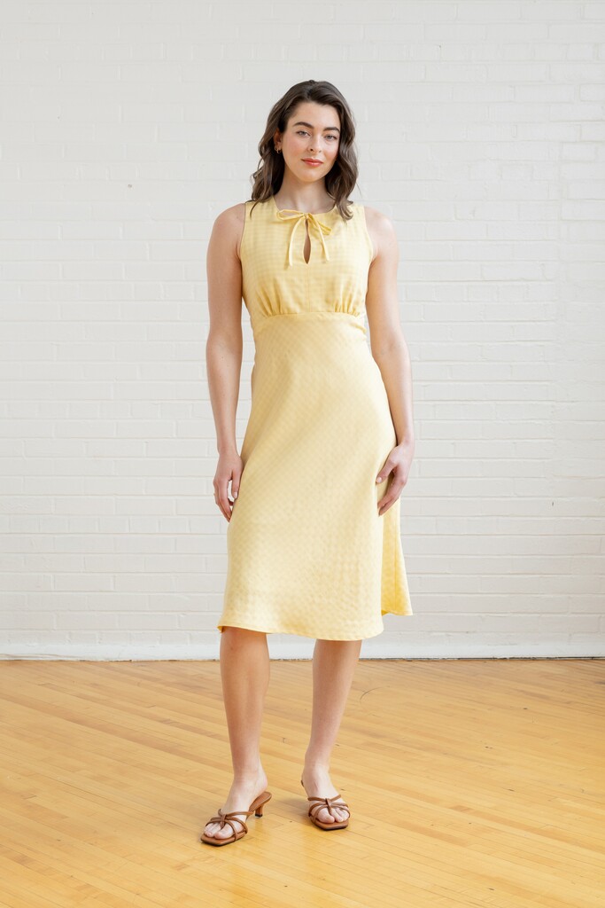 Model wearing yellow Freesia dress