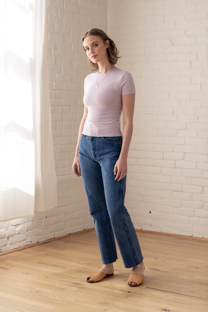 Woman wearing a Lilac Morgan t-shirt