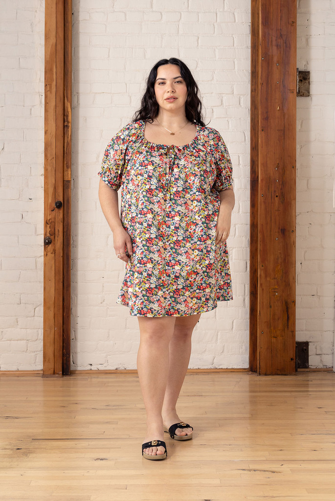 model wearing floral pearl dress