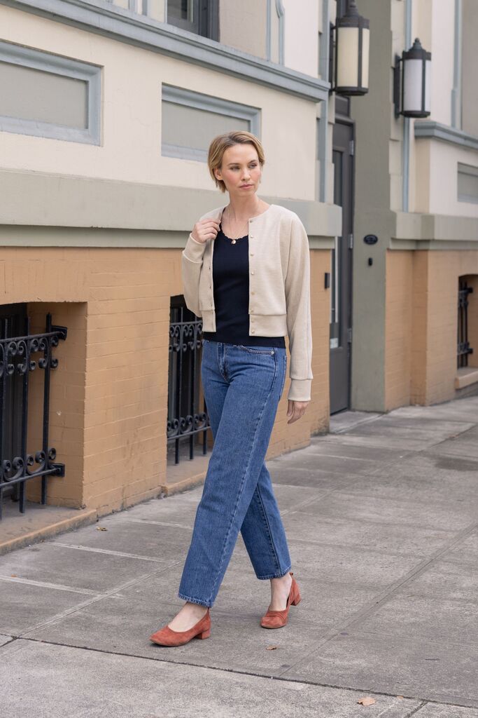 Woman modeling cream Opal cardigan
