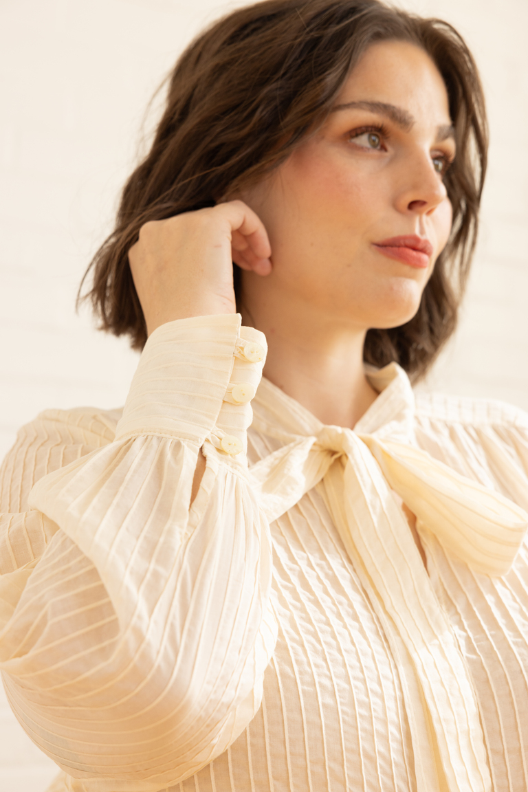 The Garnet Modern Tie Neck Blouse sewing pattern, from Seamwork