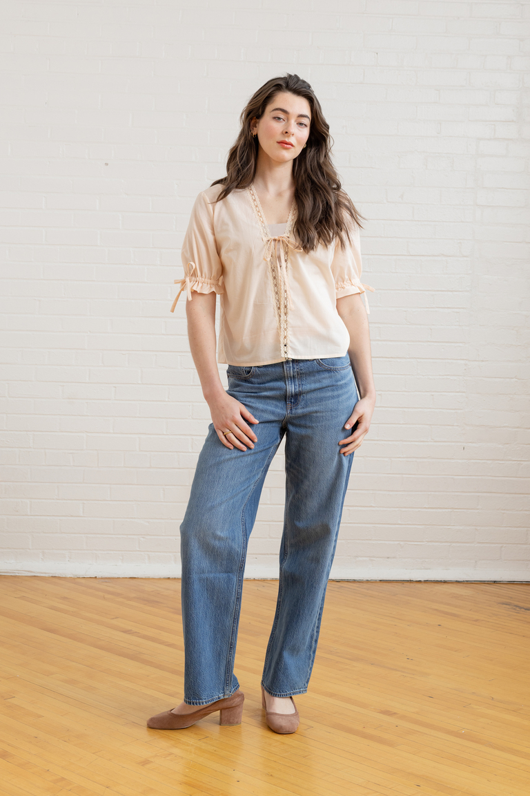 The Orchid Puff Sleeve Tie Front Top sewing pattern, from Seamwork