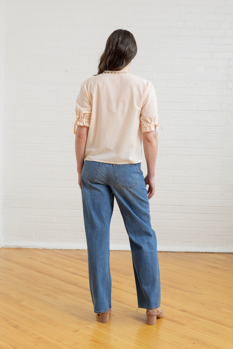 The Orchid Puff Sleeve Tie Front Top sewing pattern, from Seamwork